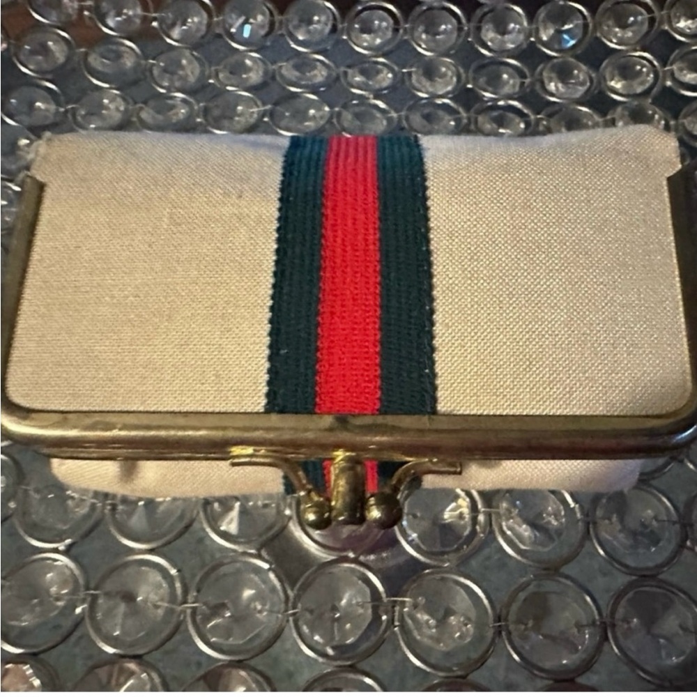 Gucci 1970 Kiss lock sewing cosmetic bag.